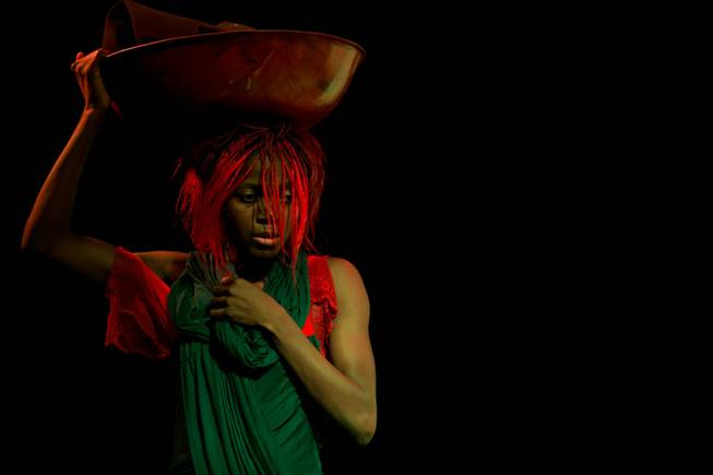 Wassa Coulibaly performs at Baobab Stage theater during dress rehearsals for her original work "The Red Dress", Tuesday, Oct. 30, 2012.